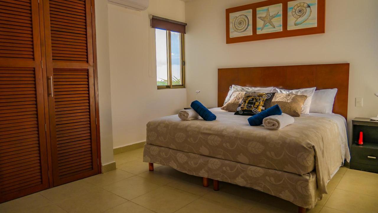 Sunset Isla Mujeres Aparthotel Bagian luar foto
